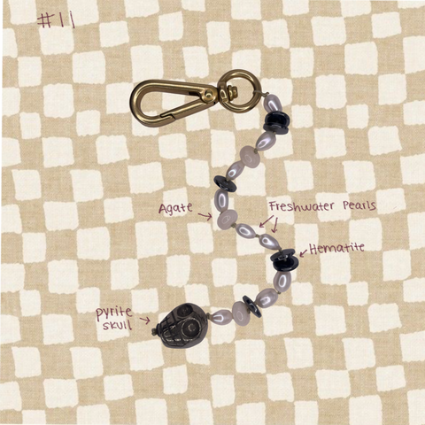 dark upcycled beaded charm, one of a kind, sustainable handmade jewelry